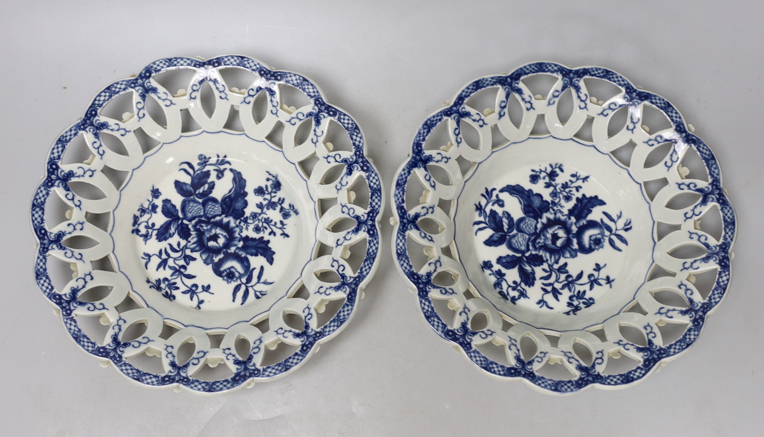 A good pair of Worcester pieced baskets of impressive size printed with the Pine Cone pattern under a painted border, c.1775, each 23cm in diameter